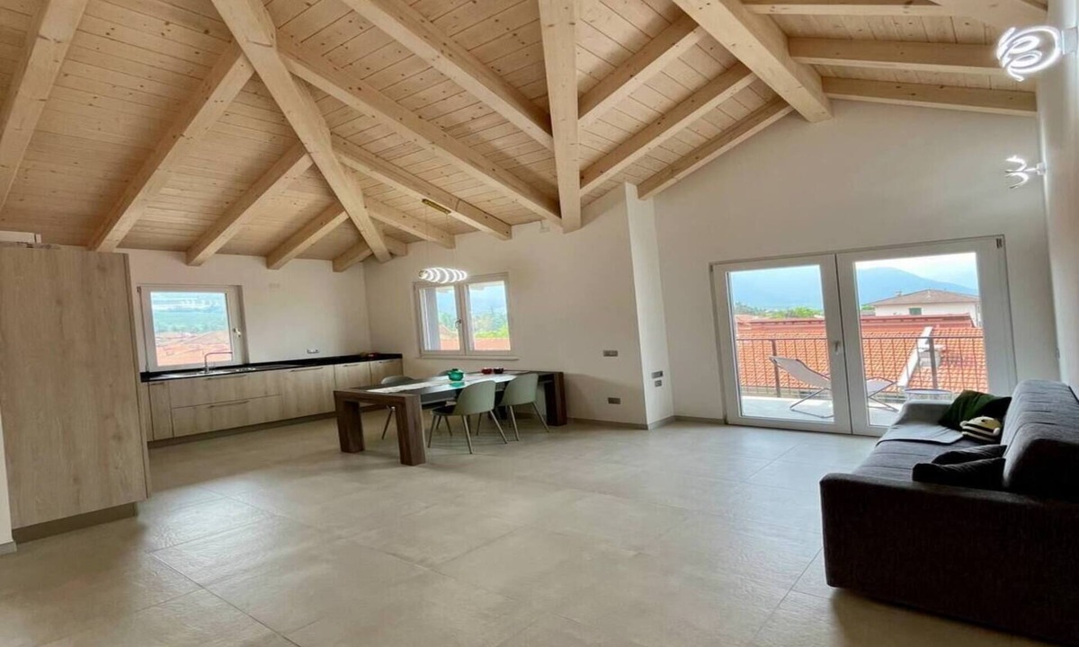 Taio Apartment | Apartment 'Il Melario' with Mountain View, Shared Garden and Balcony