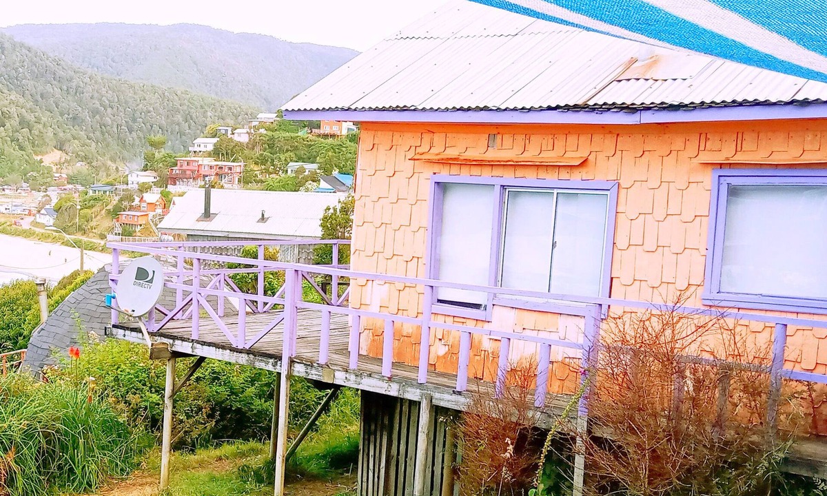 Bahia Mansa Cabin | Cabaña Maicolpue Rio Sur has a large terrace with beautiful ocean view.