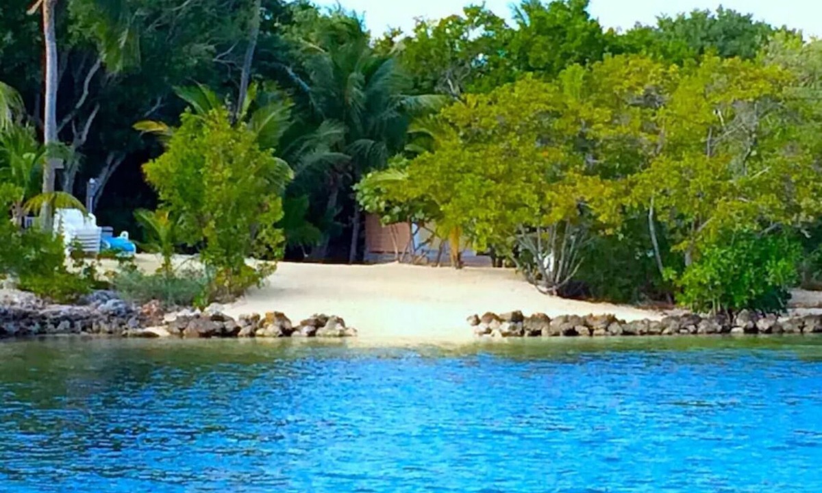 Anglers Park House | Historic Waterfront Home - 2 acres- Dock, Garden -Beach in Key Largo sleeps 16