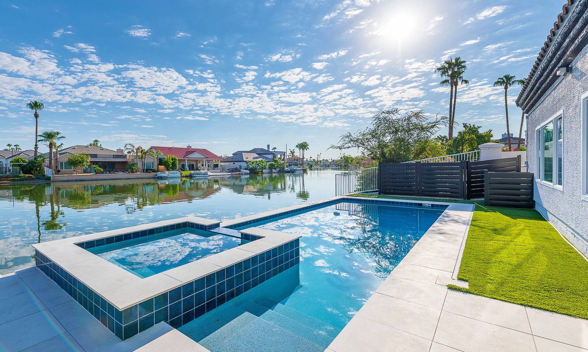 Val Vista Lakes House | Lakefront Lux by HomeSlice Stays