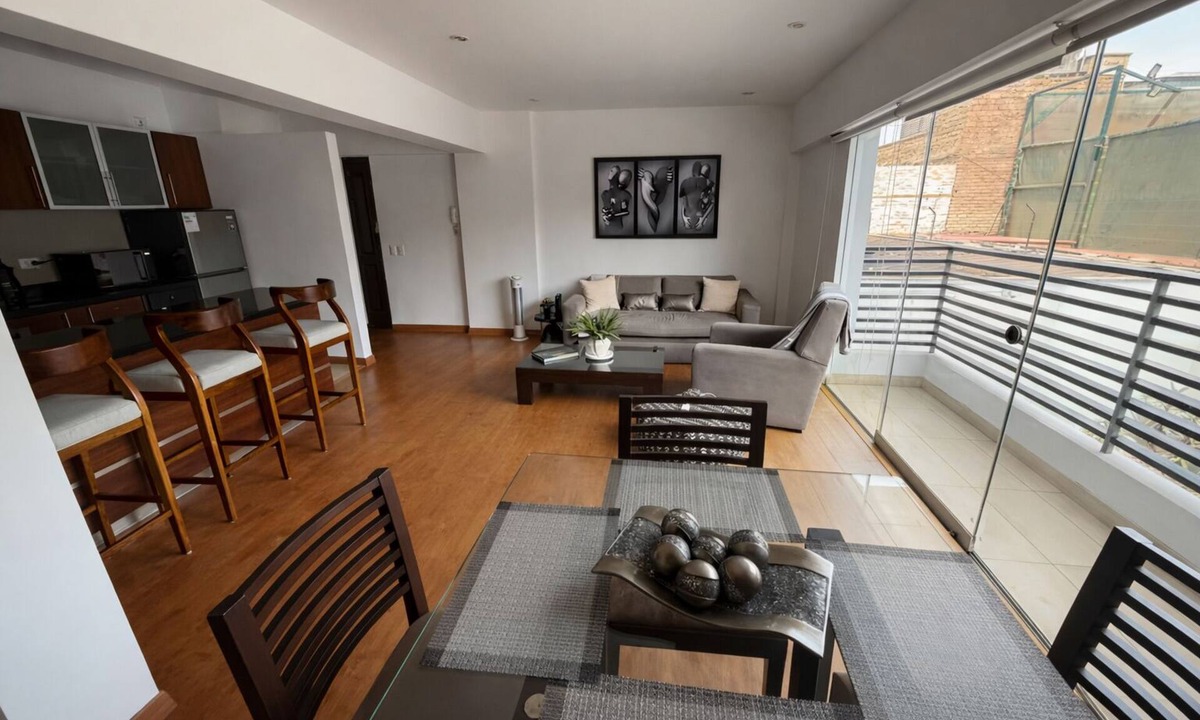 Miraflores Apartment | Luxury Executive 1BR with Balcony in Prime Miraflores – Walk to Dining & Parks