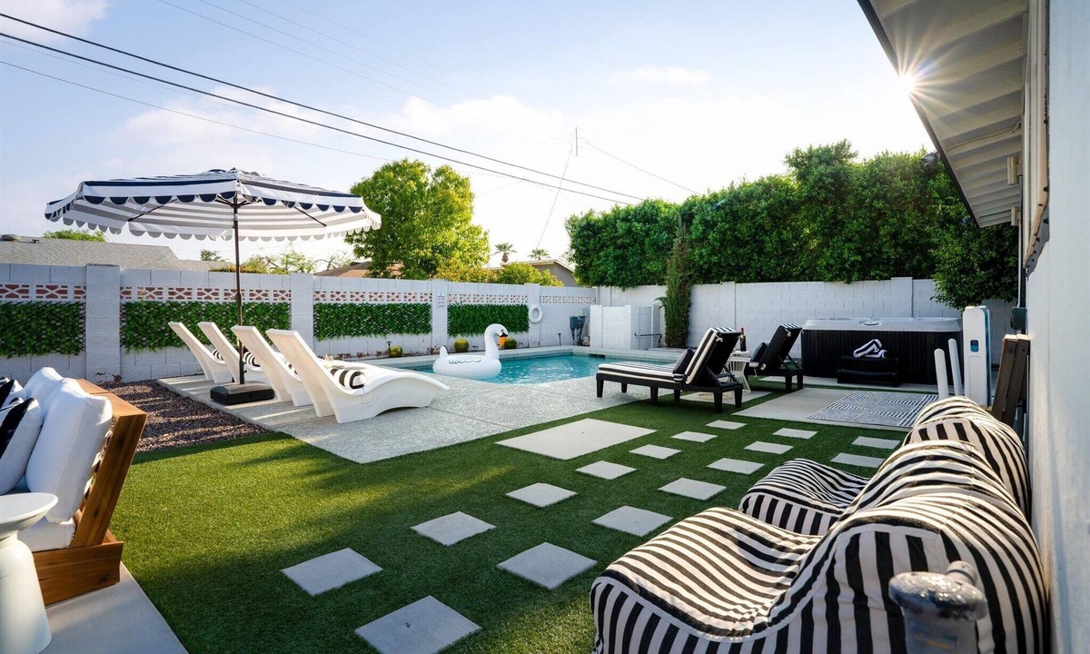 Village Grove House | The Aria - 4BR/3BA Oasis with Heated Pool, Spa & Fun Games