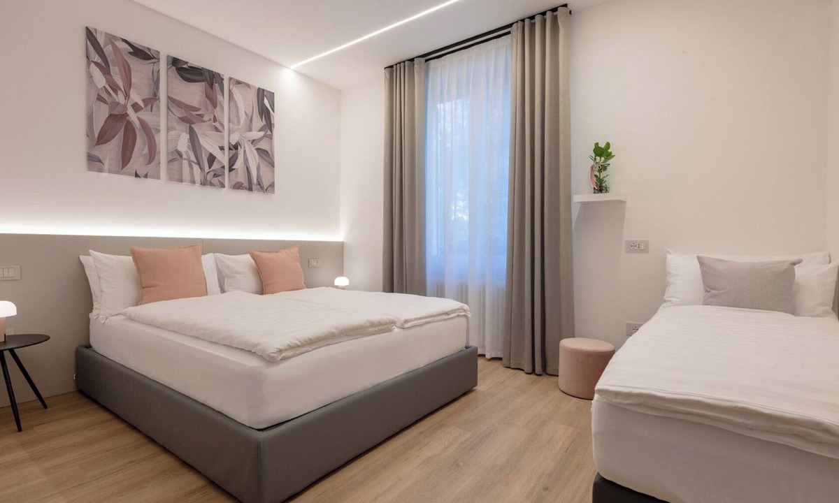 Trento House | Triple room consisting of double bed and single sofa bed