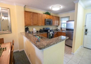 Family Group Getaway NEAR DISNEY! Three Comfy Suites, 4 Pools, Shuttle to Parks