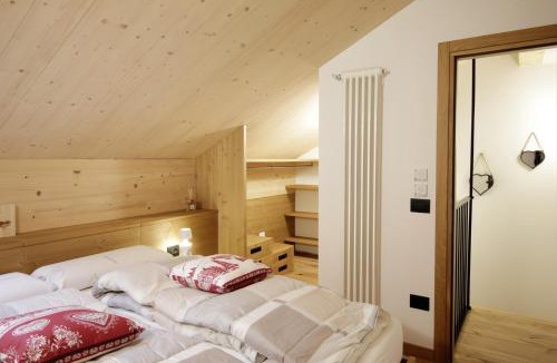 Dosso Veronza Apartment | ALPINE LOFT - Residence Veronza con piscina, Dolomiti Affitti
