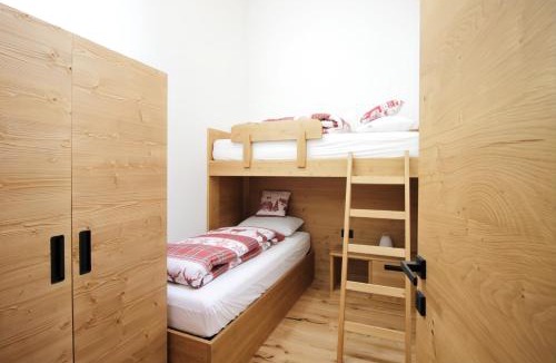 Dosso Veronza Apartment | ALPINE LOFT - Residence Veronza con piscina, Dolomiti Affitti