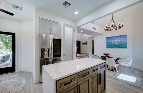 The Islands House | An Oasis with cascading waterfalls in your backyard