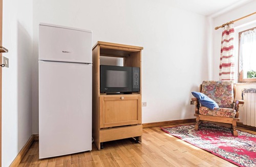 Sella Giudicarie Apartment | Apartment "Baita Località Cap" with Garden & Mountain View