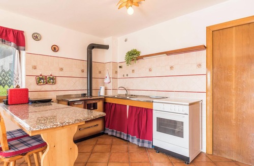 Sella Giudicarie Apartment | Apartment "Baita Località Cap" with Garden & Mountain View