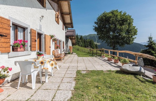 Sella Giudicarie Apartment | Apartment "Baita Località Cap" with Garden & Mountain View