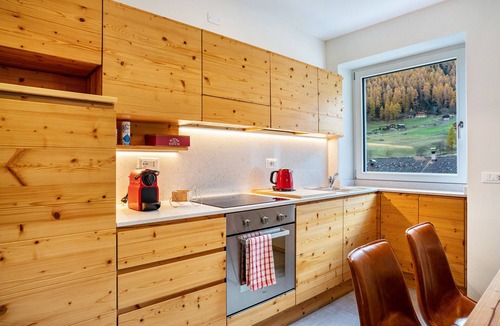 San Bernardo Apartment | Apartment 'Casa Vacanza Peter Val Di Rabbi' with Mountain View, Shared Garden and Wi-Fi