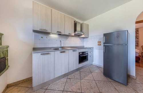 Vigo di Fassa Apartment | Apartment "Ciasa Sommavilla Calendula" with Mountain View, Shared Garden & Wi-Fi