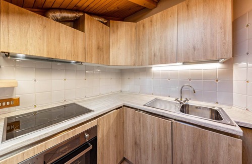 Vigo di Fassa Apartment | Apartment "Ciasa Sommavilla Mansarda" with Mountain View, Shared Garden & Wi-Fi