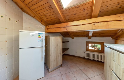 Vigo di Fassa Apartment | Apartment "Ciasa Sommavilla Mansarda" with Mountain View, Shared Garden & Wi-Fi