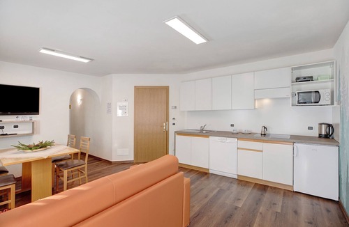 Tesero Apartment | Apartment "Foresto Superior" with Mountain View, Pool, Sauna & Garden