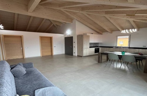 Taio Apartment | Apartment 'Il Melario' with Mountain View, Shared Garden and Balcony