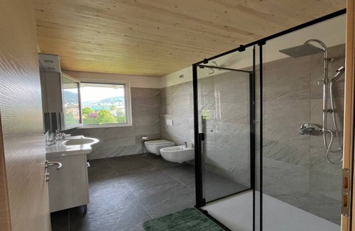 Taio Apartment | Apartment 'Il Melario' with Mountain View, Shared Garden and Balcony