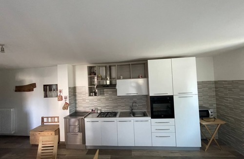 Revo Apartment | Apartment in the mountains, view of the Maddalene chain -Trentino-Alto Adige CIN