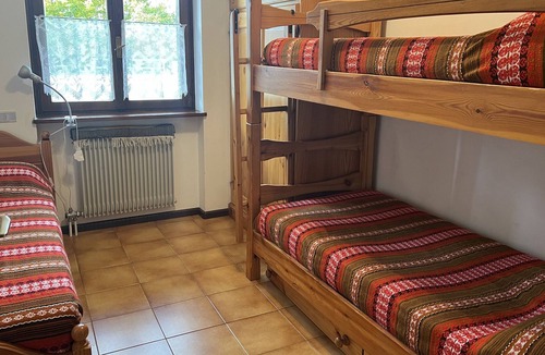 Dosso Veronza Apartment | Apartment 'Lagorai 16 Villaggio Veronza' with Mountain View, Shared Garden and Balcony