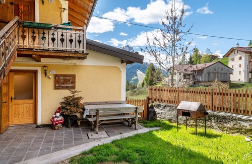 San Giovanni di Fassa Apartment | Apartment 'Muncion Apparte' with Mountain View & Shared Garden