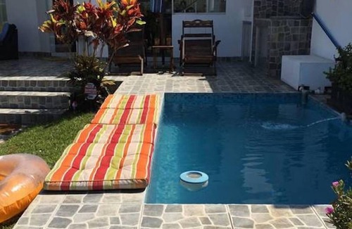 Asia House | Beach House in Asia at KM 97.5 w/Wi-Fi - Mins to boulevard and Cayma beach.