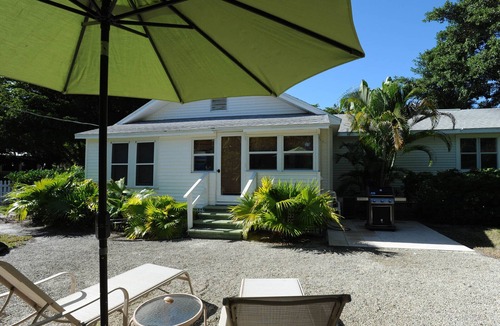 Downtown Boca Grande Historic District House | Blissfully Serene Palm Cottage In Town and 2 Blocks from Beach