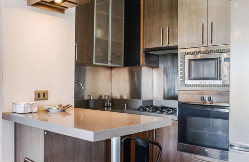 El Golf Apartment | Chic 2BR | Your Cozy Getaway Oasis in Las Condes