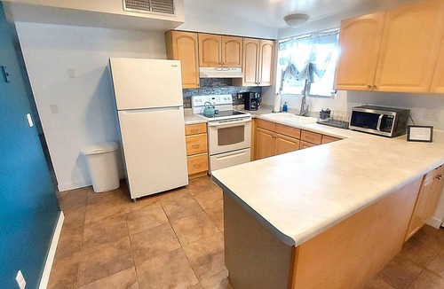 Harrison East South House | Clean & quiet retreat with private backyard near shopping & trails.