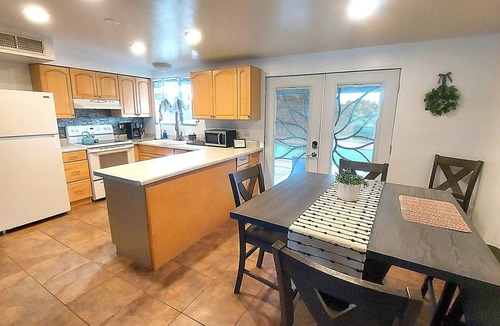 Harrison East South House | Clean & quiet retreat with private backyard near shopping & trails.