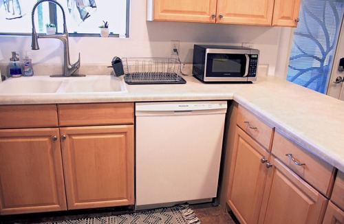 Harrison East South House | Clean & quiet retreat with private backyard near shopping & trails.