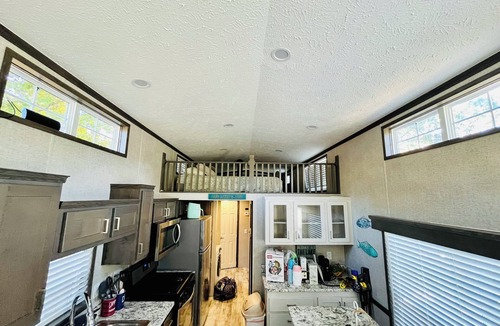 Speedwell Cabin | Cozy waterfront loft retreat with private dock, and lake access.