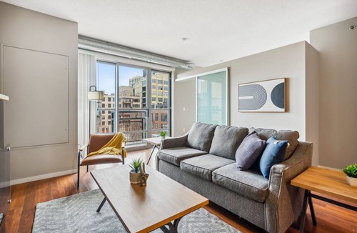 Mill District Apartment | CozySuites Mill District with pool, gym # 09