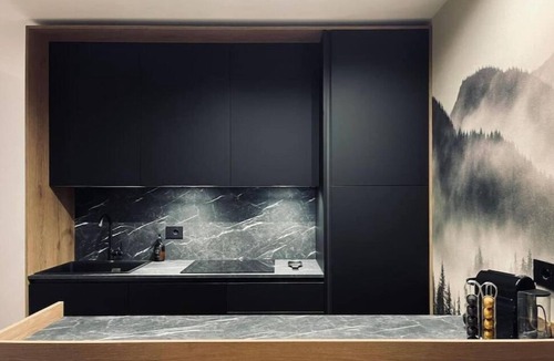 Tesero Apartment | Dolomiti Haus 300 ft from Pampeago ski lifts.