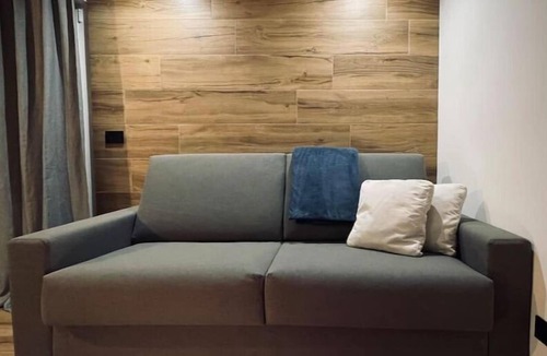 Tesero Apartment | Dolomiti Haus 300 ft from Pampeago ski lifts.