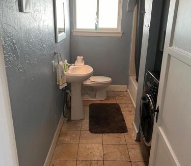 F. Q. Story House | Downtown Neighborhood Room 1