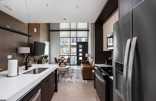Mile Square Apartment | Downtown Townhouse: Game Room+Pool+Gym