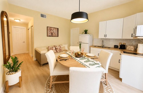 Tamiami House | E&A SouthWest - Sandy Beach Suite with Private Terrace