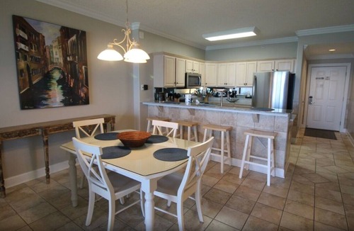 West Panama City Beach Condo | Emerald Isle 1006 - Front row beach chair service included! Affordable rates!
