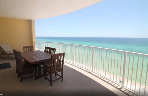West Panama City Beach Condo | Emerald Isle 1006 - Front row beach chair service included! Affordable rates!