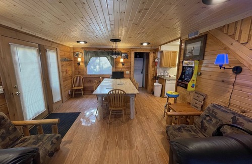 Warrens Cabin | Entertainment Cabin: With 8 Large screen TV's on 1 wall. Great for small groups
