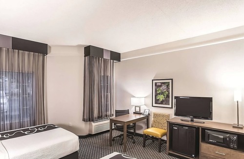 Woodlands Village Hotel | Excellent Choice! Swimming Pool, Outdoor Hot Tub, near Arizona Snowbowl