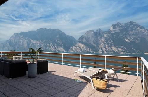 Torbole sul Garda Apartment | Exclusive residence in Torbole with breathtaking views, large terrace.