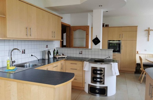 Kurtatsch an der Weinstraße House | Family apartment with playground and terrace surrounded by vineyards