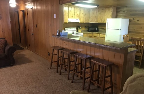Pinetop-Lakeside Cabin | Family Friendly Lakefront Cedar Log Cabin on 2 acres at Rainbow Lake.