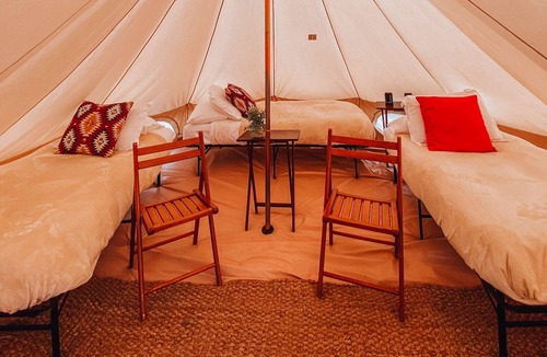 Tropic House | Family Tent w/Shared Bathroom - Beauty awaits you just past the red cliffs.