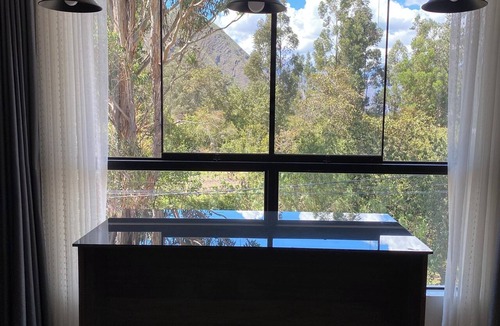 Urubamba Apartment | FULL-SIZE SUNROOM WITH PANORAMIC VIEWS AND A BATHTUB