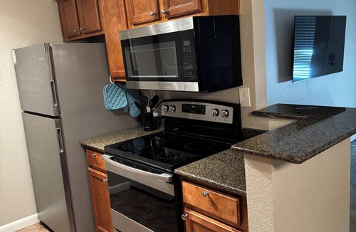 Las Colinas Horizontal Condo | Fully furnished next to Greenbelt and close to Olde Towne & Fashion Square.