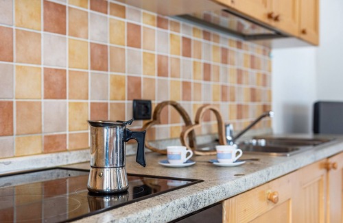 San Giovanni di Fassa House | Holiday Home 'Casa Titol Ami' with Mountain View, Balcony and Wi-Fi