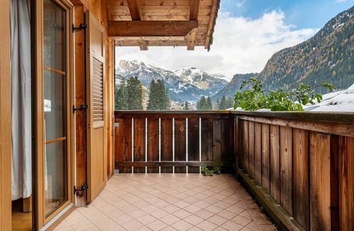 San Giovanni di Fassa House | Holiday Home 'Casa Titol Ami' with Mountain View, Balcony and Wi-Fi