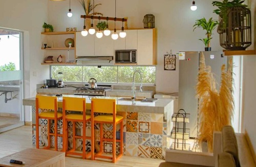 Centro Poblado Canyar Villa | HOP Praia: Modern Home with Lagoon View